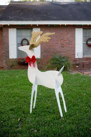 Led metal deer family christmas yard decoration 30 Diy Outdoor Christmas Decorations Best Holiday Porch Decor