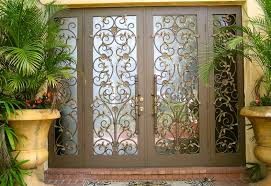 Flowers can include yellow mums, ornamental kale, purple sage flowers, red or orange berries from the viburnum or the bittersweet and a bit of moss. Hurricane Impact Doors Mediterranean Entry Miami By Statewide Windows Doors Houzz