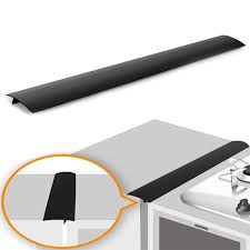 Maybe you would like to learn more about one of these? Tsv Silicone Stove Counter Gap Cover Heat Resistant Kitchen Stove Counter Gap Filler Silicone Gap Cover Seals Spills Between Counter Stovetop Oven Washer Dryer 21 Inch Black Walmart Com Walmart Com