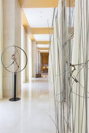 With Direct Access To Difc Gate Building The Ritz Carlton Dubai International Financial Centre Is A Luxurious Hot Financial Centre Ritz Carlton Elegant Decor