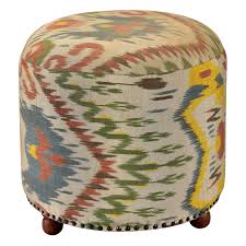 This coffee table set includes one larger table and one smaller table that provide space to spread out snacks or set down cocktails when you have company. Silk Ikat Pouf Ikat Ottoman Hand Woven And Hand Dyed