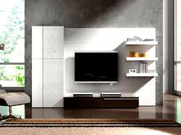 While the entire room is in different shades, the tv unit design here is in all white, making it stand out in the space. Youngmenheaven Living Room Small Wall Tv Unit Design