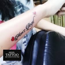 Mom S Angel Tattoo Tattoo For Mother Small Tattoo For Wrist Tattoo For Girls Tattoo Gurgaon Tattoo Designs For Girls Little Tattoo For Girls Tattoo Designs