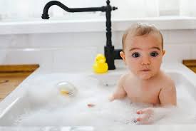 Im sure i swallowed plenty of the soap as a 60lb kid. Top 10 Baby Bathing Tips Kitchen Sink Baby Bath