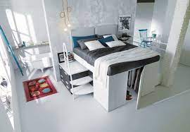 Don't assume that compact living equals boring furniture! Smart Space Saving Bed Hides A Walk In Closet Underneath Space Saving Beds Space Saving Furniture Space Saving Bedroom