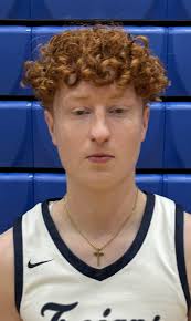 Stifling defense leads Trojans over Wilson, 50-37