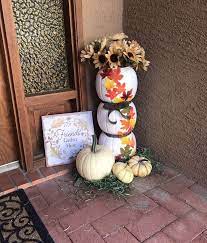 This plastic pumpkin bucket makeover is a great dollar store craft that'll let you move your decor from halloween to fall in a snap! Dollar Plastic Pumpkin Bucket Craft Ideas Crafty Morning Fall Thanksgiving Decor Pumpkin Bucket Crafts Plastic Pumpkins Crafts