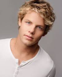 Falke was almost as tall as Harper. He was apparently going through a  growth-spurt, as his pants ended unfashionably just above his ankles. He  brushed the sandy hair out of his gray-blue