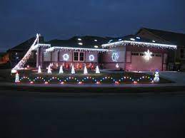 Clear case with white wire and warm white lights. Mini Leaping Arches Technicolor Christmas Christmas Arch Diy Christmas Lights Christmas Yard Decorations