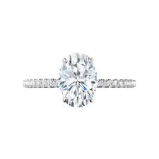— but you might notice just a few tiny differences, like the extravagance of the wedding dress, the size and cost of the venue — and the price tag on the engagement ring. Gia 2 50 Carat Oval Diamond Hidden Halo Engagement Ring 18k Etsy