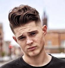 45 Different Fade Haircuts Men Should Try In 2020 Mens Haircuts Fade Wavy Hair Men Faded Hair