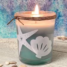 They can be purchased in bulk from many candle and craft supply stores, and these small, simple votive holders are great to add to centerpieces for extra flair. Diy Sea Shell Votive Candle Craft The Country Chic Cottage