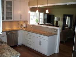 The half wall also creates the perfect corner to accommodate extra appliances like the oven. 60 Stunning Half Wall Kitchen Designs Ideas Roundecor Kitchen Layout Living Room Kitchen Kitchen Remodel Small