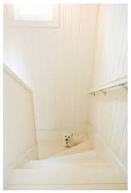 This bathroom from jenna kate at home is a small, fairly dark room with just enough natural light that it would be blindingly bright if painted with a crisp white. Benjamin Moore Swiss Coffee Room Lust