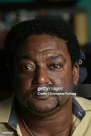 Neo-Nazi attack victim Noel Martin sits in a wheelchair in his home... News  Photo