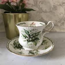 Description:a trio of royal albert fine bone china moss rose pattern.side plate.footed cup and saucer.made in england,the montrose shape set has a floral design with gold trim on the edge. Queen S China Tea Cup And Saucer Set May Flower Of The Etsy China Tea Cups Tea Cups Cup And Saucer Set