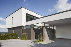 Moderne Architektur Mit Offener Garage Einfahrt Mit Palladio Von Metten Verlegt Hochwertige Materialien Moderne Architektur Anbau Haus Modernes Haus