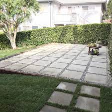 Large Pavers Used To Create Patio In Backyard Quick And Easy Alternative To Building A Full Deck Large Backyard Landscaping Pavers Backyard Diy Patio Pavers