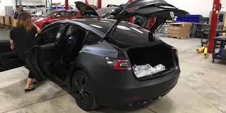 The tesla model 3 cruising around new jersey. Tesla Model 3 S Back Seats Will Fold Flat With 5 6 Of Space In The Back Electrek