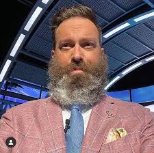 With one day to go before hockey returns, here's the present state of  Elliotte Friedman's beard. Sportsnet's Instagram is currently running a  poll if it should stay or it should go. :