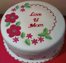 This clever cake topper is sure to be the talk of your mother's day gathering! Cake Design Ideas For Mom