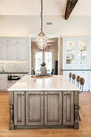 The glass shapes, glass colors and drop lengths are 3 kitchen island pendant lights. Brown Kitchen Island And Clear Glass Schoolhouse Pendants Cottage Kitchen