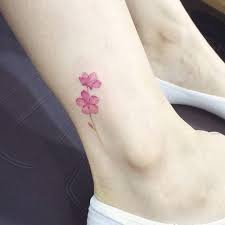 Tree with more branches and moon tattoo on the belly button. Watercolor Style Cherry Blossom Tattoo On The Ankle