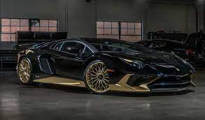 Black And Gold Lamborghini Aventador S Is One Of The Last Carscoops Gold Lamborghini Lamborghini Aventador Lamborghini Cars