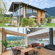 Modernes Holzhaus Mit Viel Glas Holz Fassade Satteldach Bauen Fertighaus Modern Mit Galerie In 2020 Architektur Haus Design Architektur Haus Haus Design