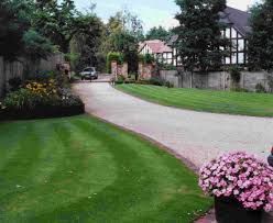 Gravel driveways require little maintenance and are typically pleasing to the eye. Home Landscape Knowledge Garden Landscaping Gravel Driveway Garden Design