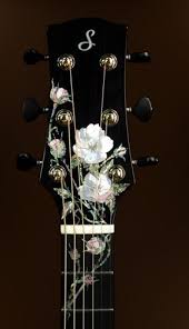 Lets see some pics of those Fancy Fretboard and Headstock Inlays!