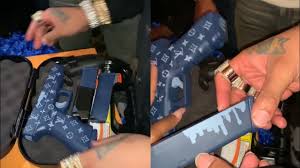 Dallas rapper yella beezy got a custom louis vuitton glock for his birthday pic.twitter.com/w52bzihkir. Yella Beezy Gets A Louis Vuitton Glocc With Designer Bullets Youtube