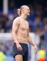 Topless Erling Haaland shows off battle scars after clash with Yerry Mina  in Man City's win over Everton | The Sun
