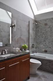 30 Small Bathroom Tub Shower Combo Ideas In 2020 Bathroom Interior Design Brown Tile Bathroom Bathroom Design