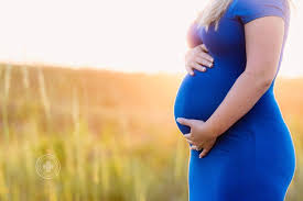 virginia beach maternity photographer sunset beach session melissa bliss photography beach maternity maternity photography poses couple maternity photographer