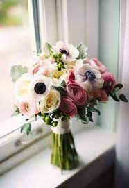 Before Calling Flower Designers Ask Good Friends And Family Members If They Have Any Recommendations The Very B Anemone Bouquet Anemone Flower Bridal Bouquet