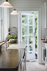 Une Maison Norvegienne Installee Au Danemark Maison D Ete Motif De Cuisine En Plein Air Porte Cuisine