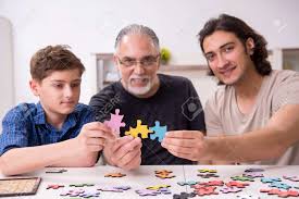 The games are timeless and fun for … Three Generations Of Family Playing Jigsaw Puzzle Game Stock Photo Picture And Royalty Free Image Image 154313526