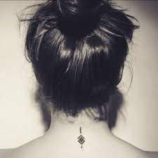 Small tattoo but you can also have large tattoos. Back Of Neck Tattoo Of A Symbol On Astrid To Remind