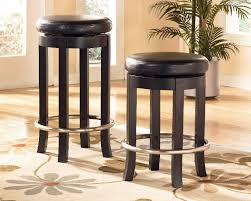 89 99 Ashley Carlyle Almost Black 24 Inch Uph Swivel Bar Stool D371 12 The Sleek Design Of The Contemporary Bar Stools Home Bar Furniture Swivel Bar Stools
