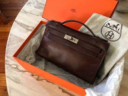 lot 300 a hermes evergrain kelly pochette leather hermes kelly luxury accessories