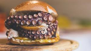 Octopus Burger Recipe How To Make A Delicious Christmas Burger With Octopus Potatoes Fried Apples And Hummus Wine Dharm Burger Fried Apples Burger Recipes