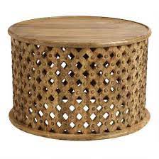 Round lattice carved wood coffee table: Tribal Carved Wood Furniture Collection World Market