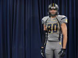 Photo West Virginia Officially Reveals All Gray Alternate Uniforms Cbssports Com Football Uniforms College Football Helmets College Football Uniforms