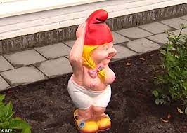 If you mean that planted area around your house, then in the garden. Naughty Naked Gnome Is Ordered To Cover Up Topless Statue Betty Is Deemed Too Rude Daily Mail Online