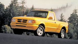 Image result for Bright Yellow 1990 Truck