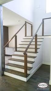 Choose from horizontal cable infill, vertical cable infill, or retrofit your existing railing system with wood & composite infill components. Ironwood Connection Cable Rail Systems Modern Stair Railing Cable Stair Railing Stair Railing Design