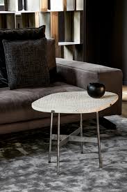 Nest the tables together to form a coffee table that is the perfect size for you, or separate the tables and scatter around the room for a cohesive living room style. Primitive Table Designer Furniture Architonic