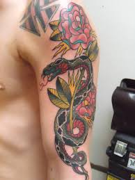 Colorful Traditional Snake With Roses Tattoo On Man Left Half Sleeve
