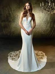 A Sumptuous Mermaid Gown Constructed With Sequin Embroidered Lace On Soft Stretch Georgette The S Enzoani Wedding Dresses Brides Wedding Dress Wedding Dresses